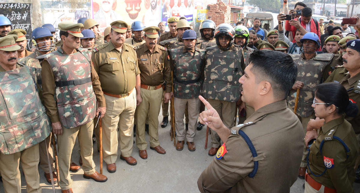 Alert in district, flag march in city