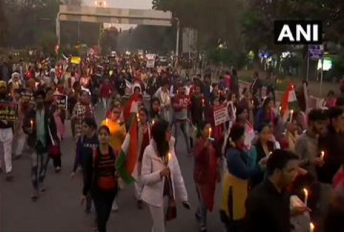 People hold candle march from Raj Ghat to India Gate in unnao case