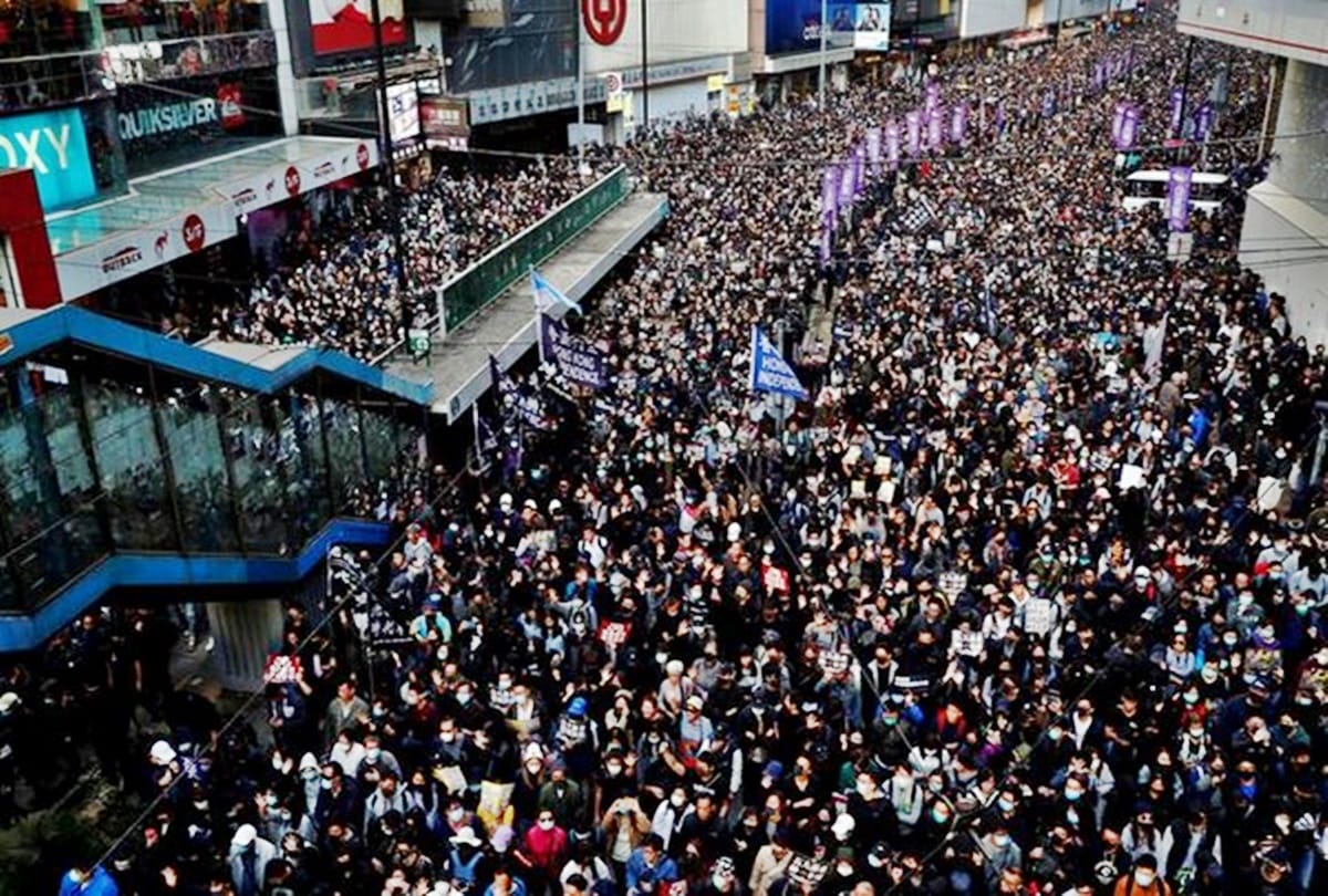 Hong Kong Tens of thousands turn up for march on evening of half year protest anniversary