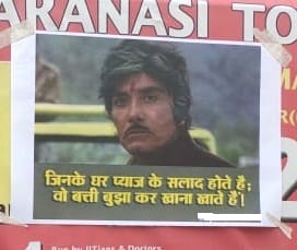 Protest against the rising price of onion showed through the poster in varanasi