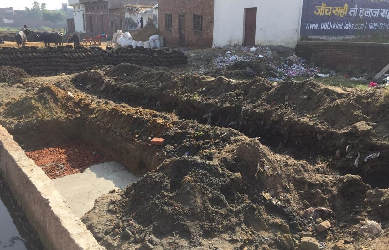 bjp leader stop the constection work of public toilet