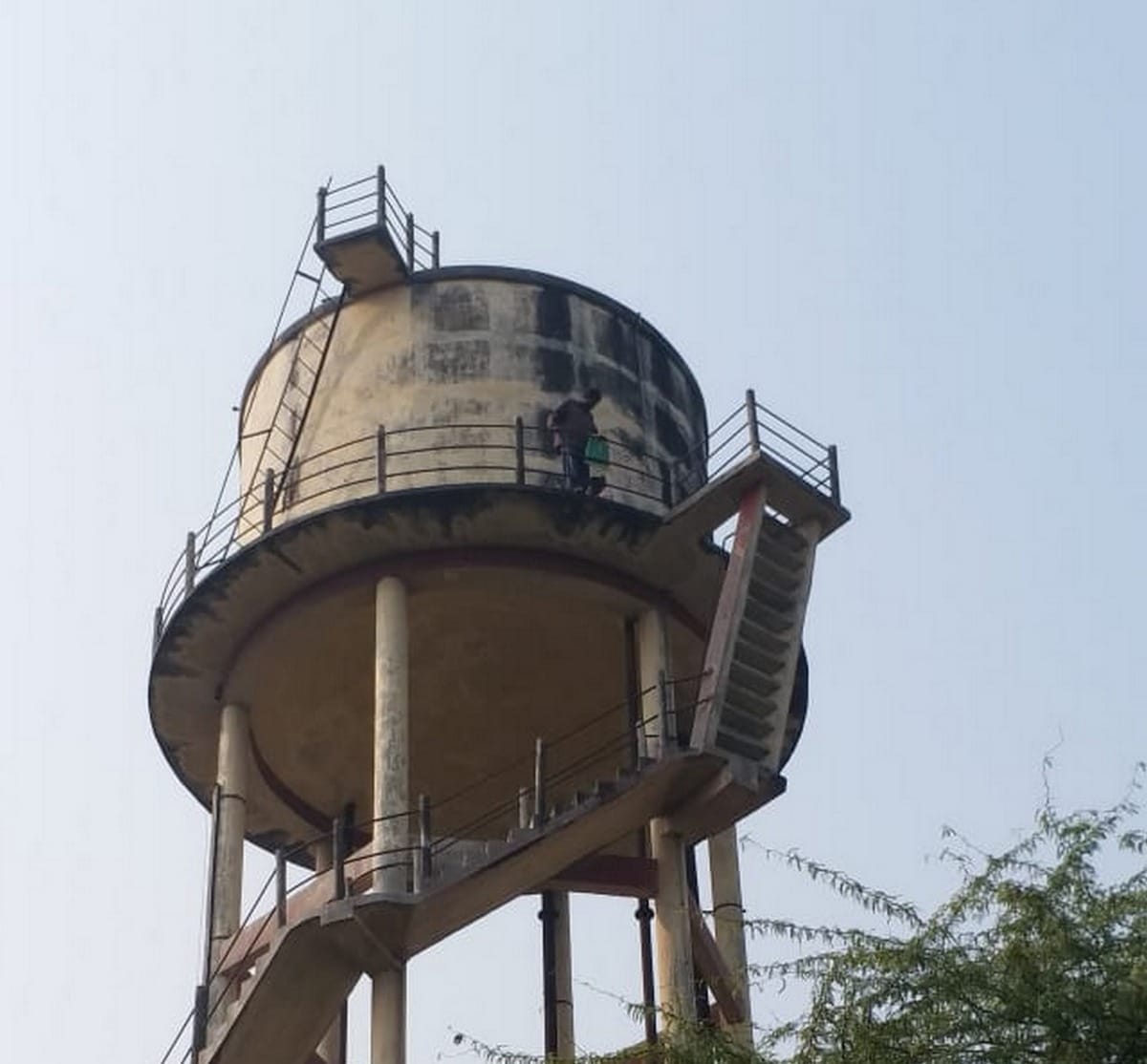 Drunk youth climbed on water tank In Basti