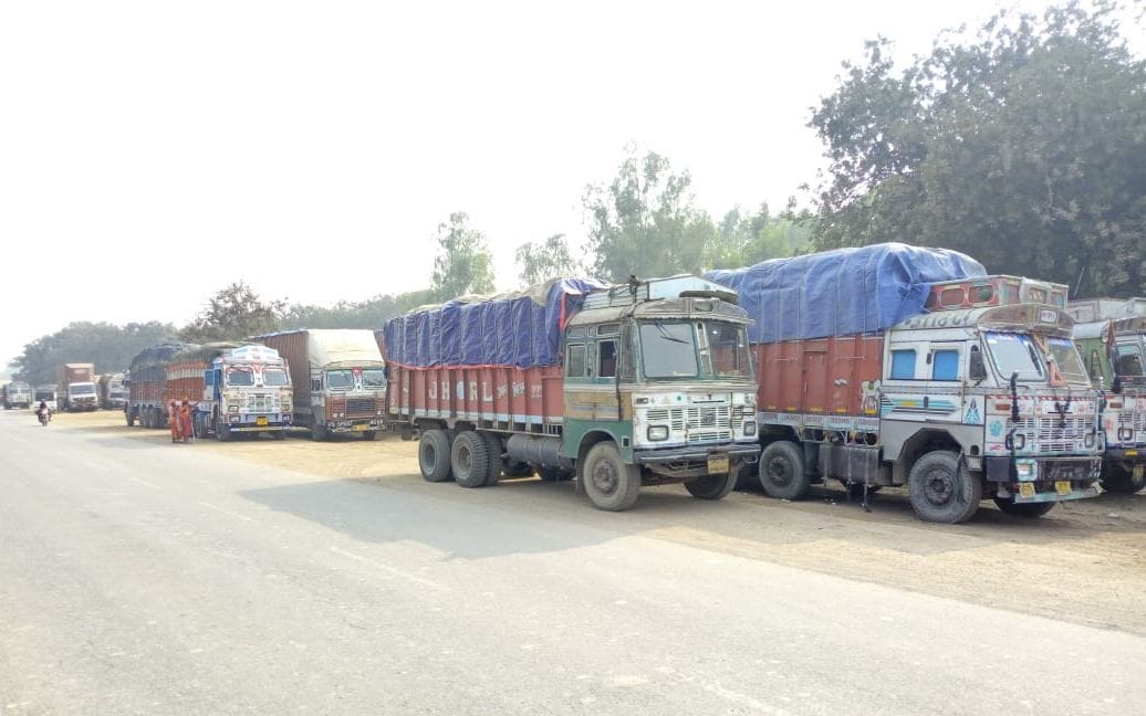 trucks standing on the road are the cause of accident