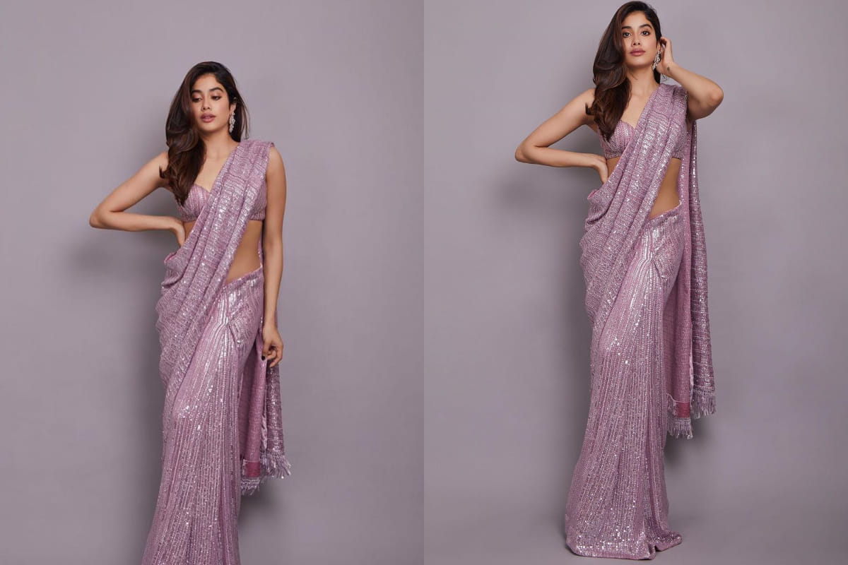 janhvi kapoor looks hot in manish malhotra purple shimmer saree