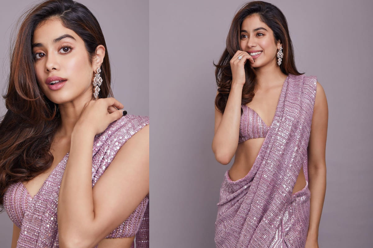 janhvi kapoor looks hot in manish malhotra purple shimmer saree
