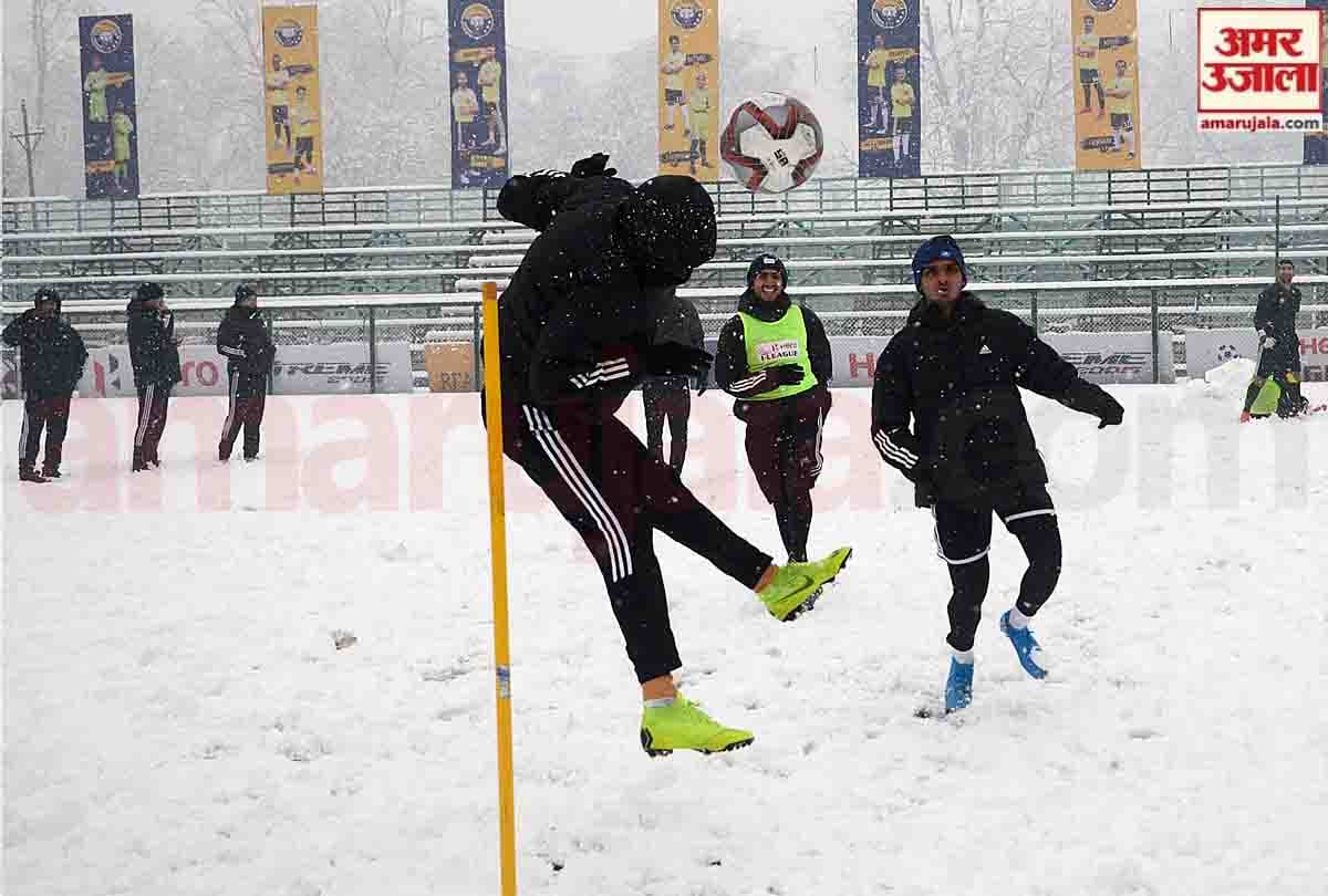 Real Kashmir players are practicing football in cold winter