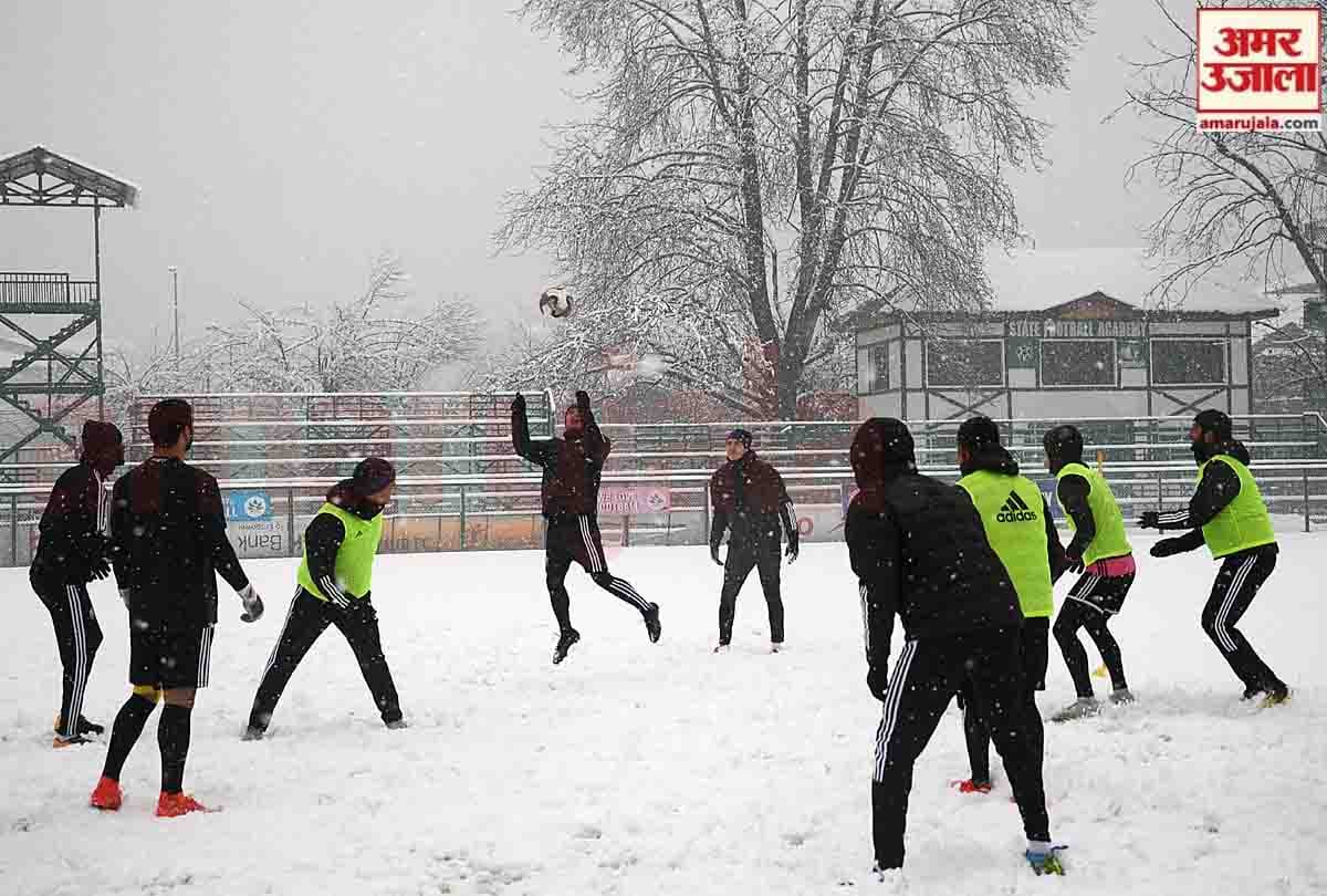 Real Kashmir players are practicing football in cold winter