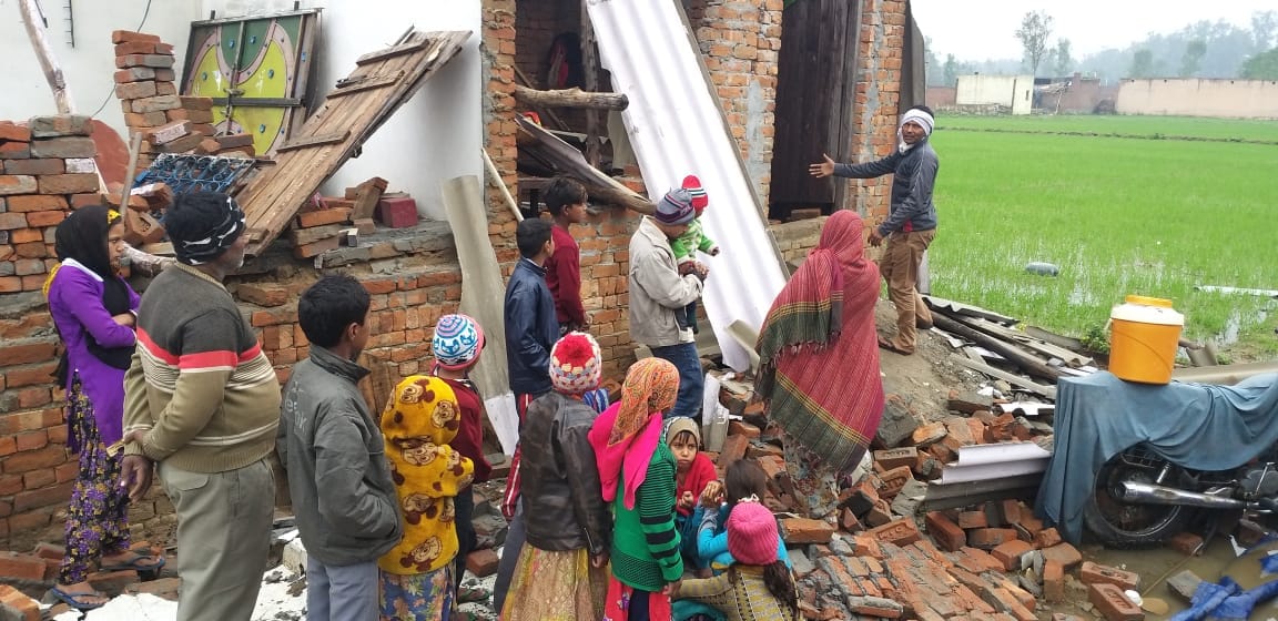 a house clashed in rain