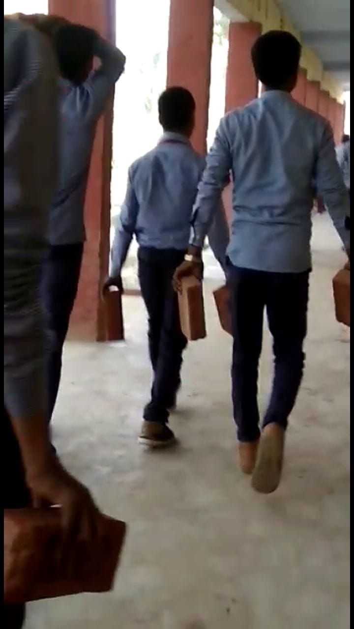 Students carry bricks in maulana aazad inter college