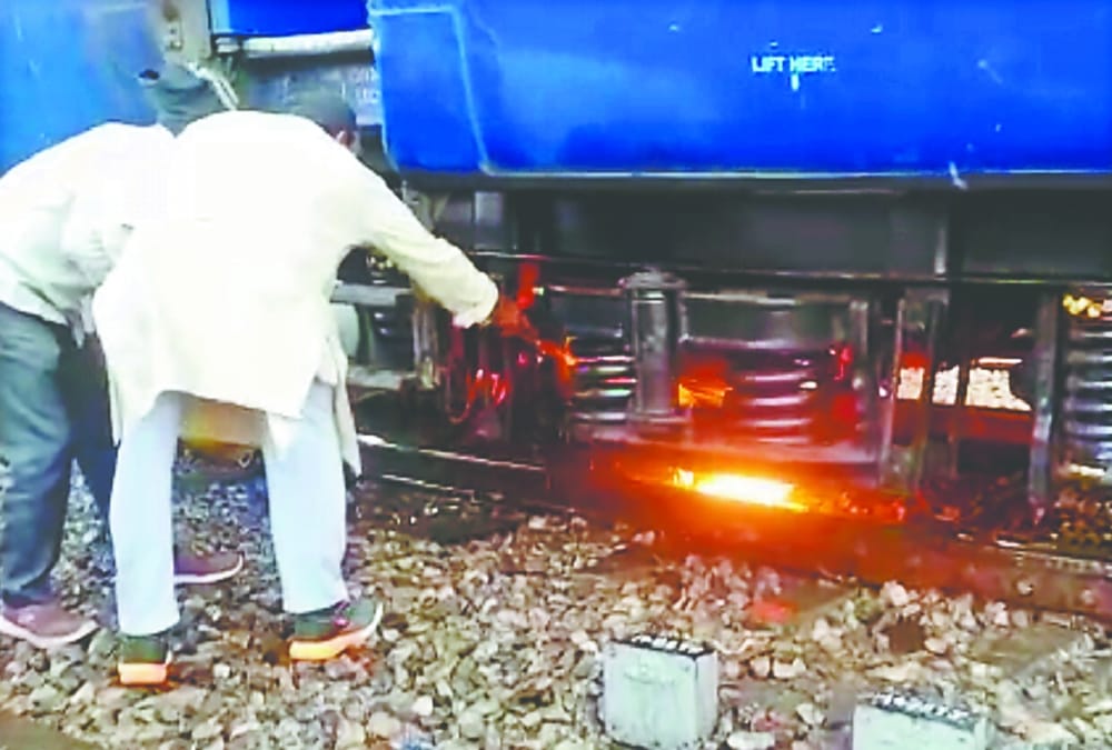 Train caught Fire after bike stuck on railway track in laksar junction