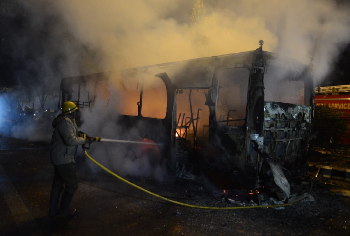 Violence In Jamia Nagar of delhi about Citizenship Amendment Act Buses and cars Burnt see photos