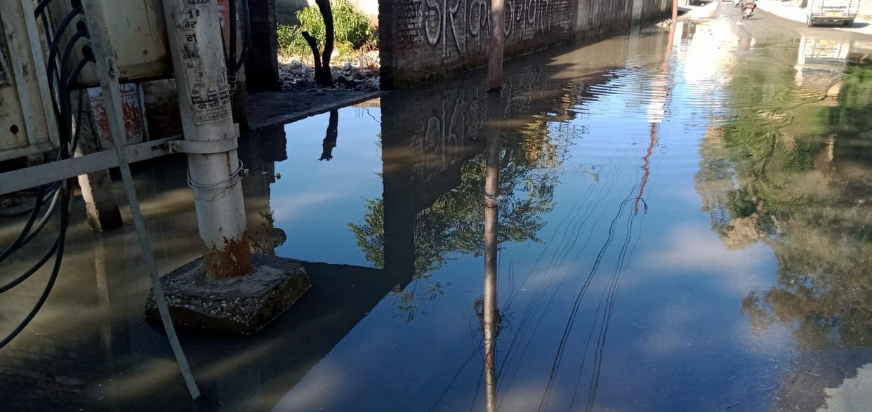 Sewer dirt accumulating on the road, passers by upset