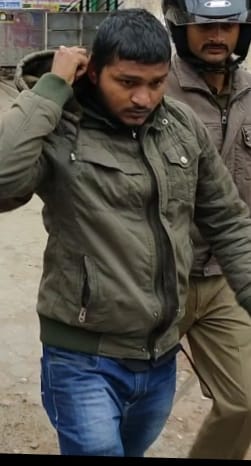 suspected boy in police custody out side the muslim inter college