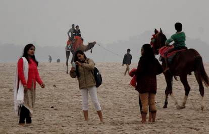 Varanasi Temperature low weather cold winter peopple on assi ghat