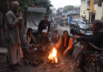 Varanasi Temperature low weather cold winter peopple on assi ghat