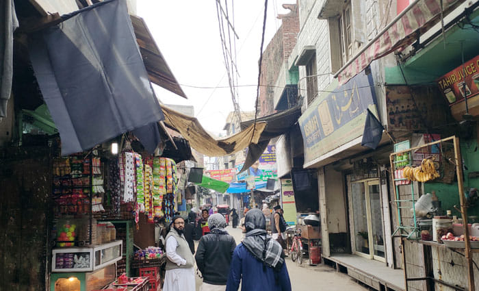 Darul Uloom area black flags on shops