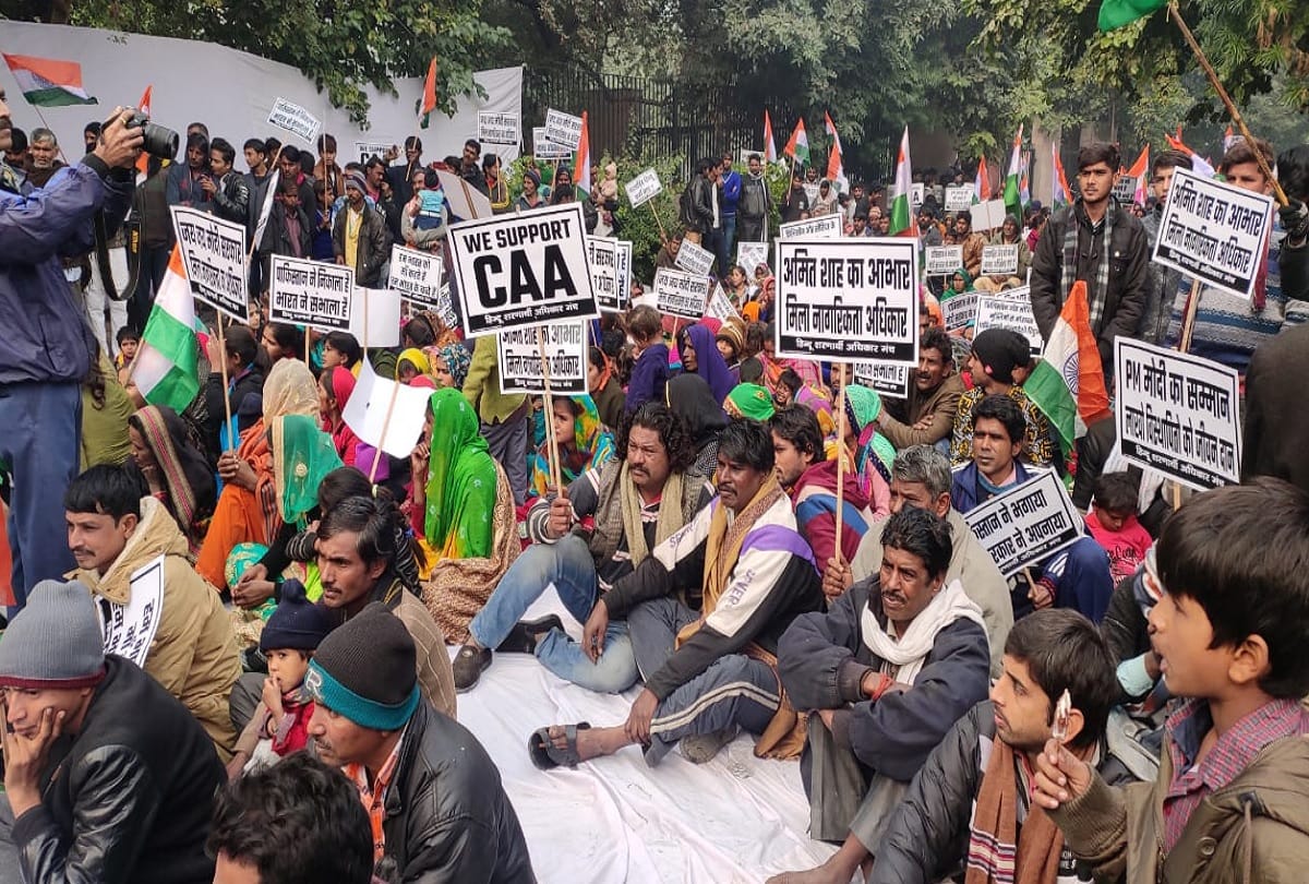 Hindu refugees protest on road in support of CAA near Rajghat