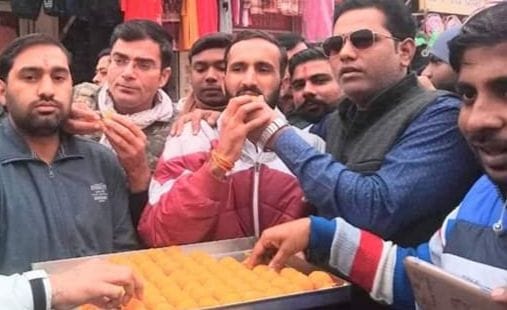 sweets distribute in the happyness of caa