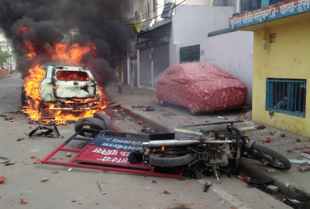 Violence and fire during protest against CAA and NRC in Lucknow.