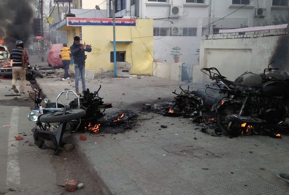 Violence and fire during protest against CAA and NRC in Lucknow.
