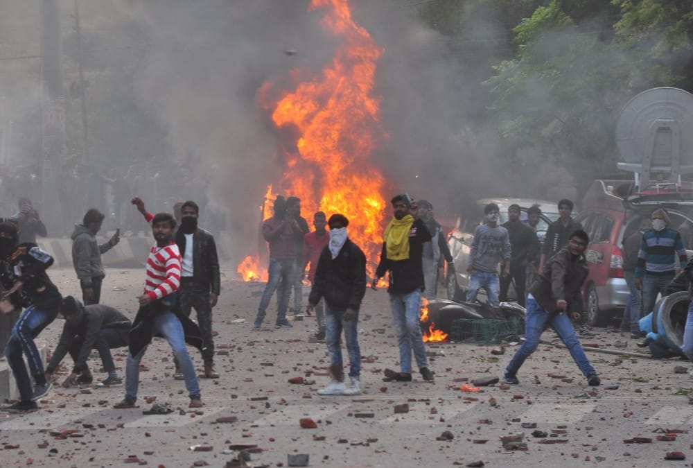 Violence and fire during protest against CAA and NRC in Lucknow.