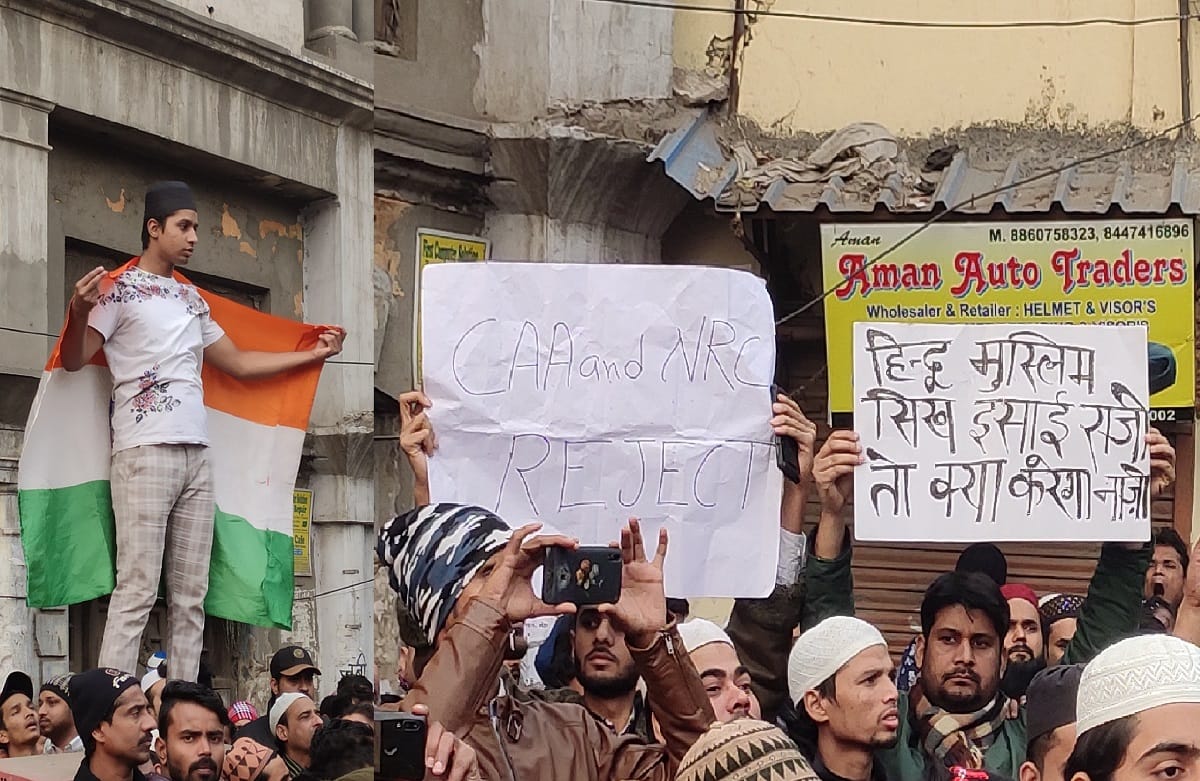 citizenship amendment act: Protesters carrying hindu muslim peace placard in hands