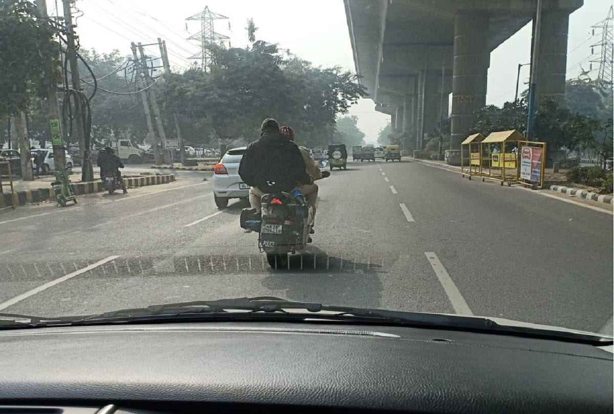 Gurugram Policeman issued challan for driving without helmet