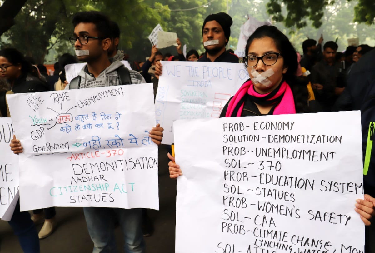 CAA protest creative slogans attract people after hearing national anthem protesters disperse