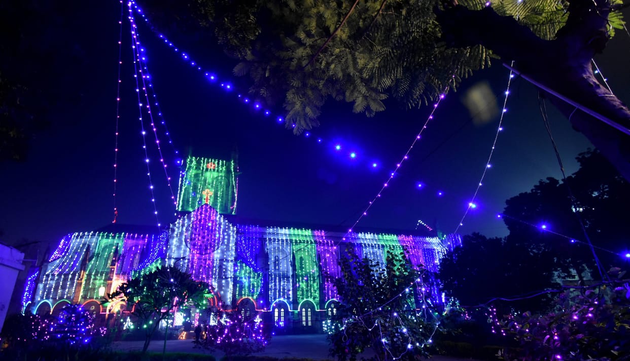 Home illuminated to welcome Jesus, church