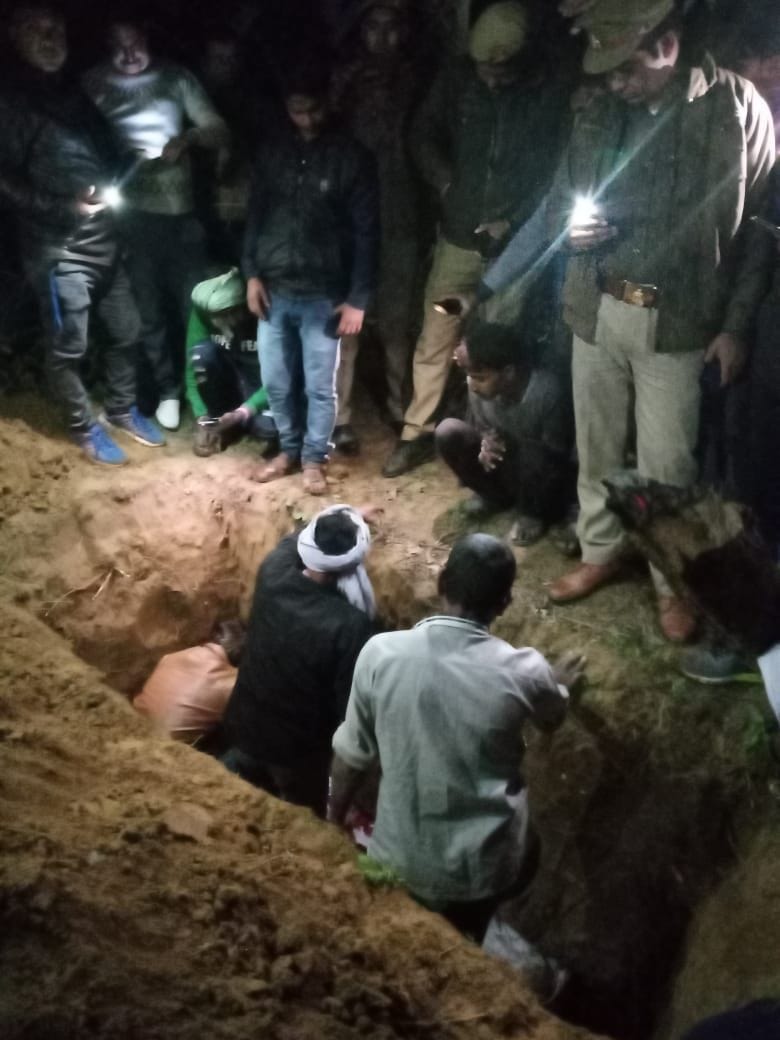 Cremation of victim's body cremated between family and police