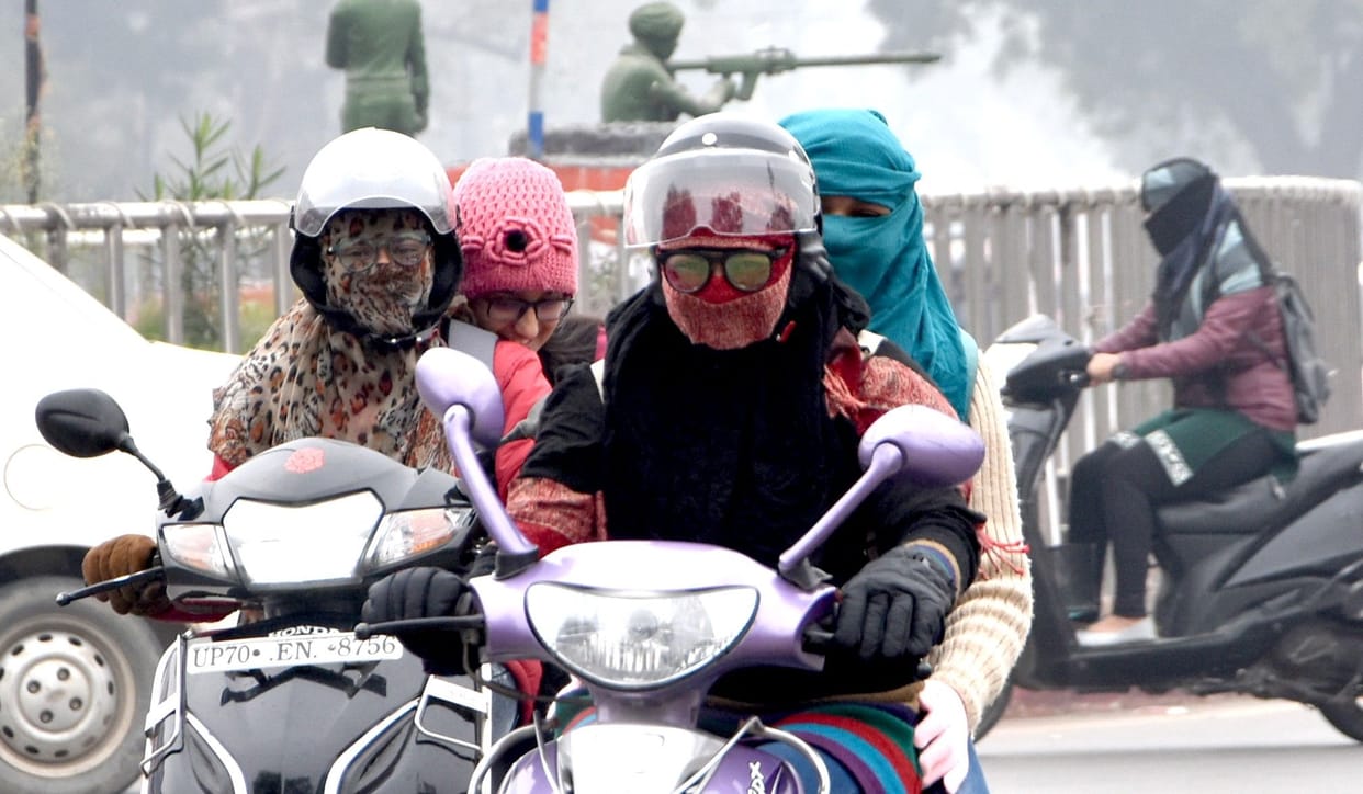 People shivering with cold, cold weather