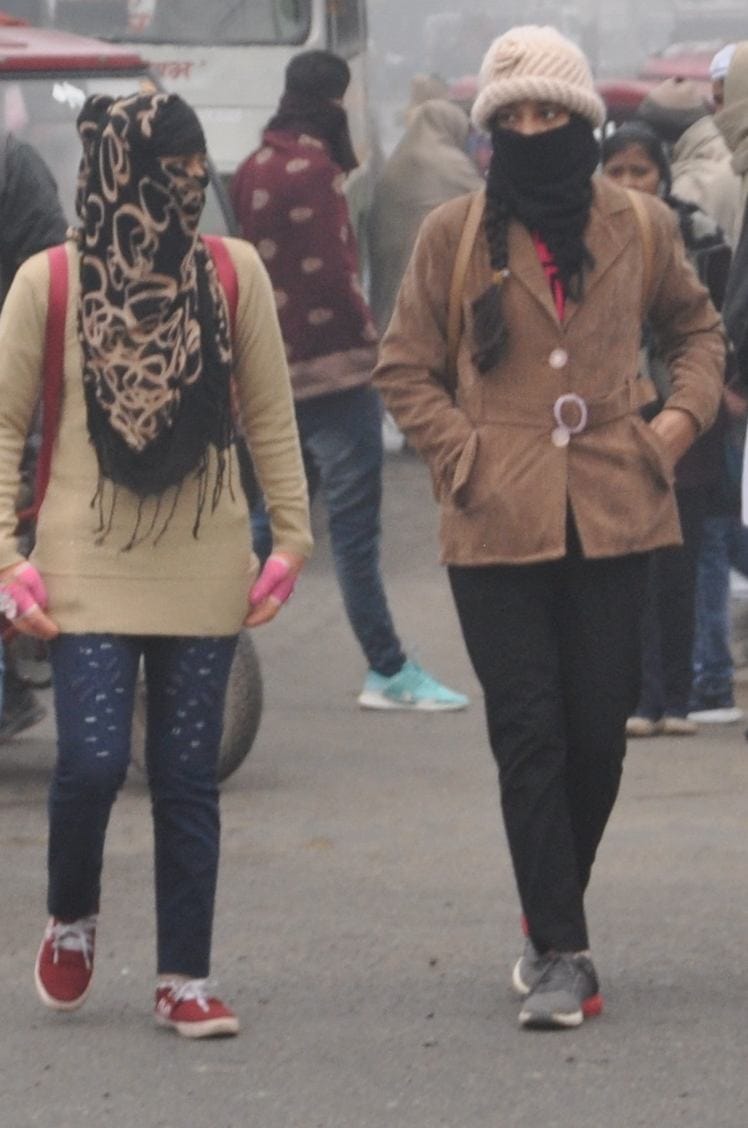 The cold hardened, shivering residents