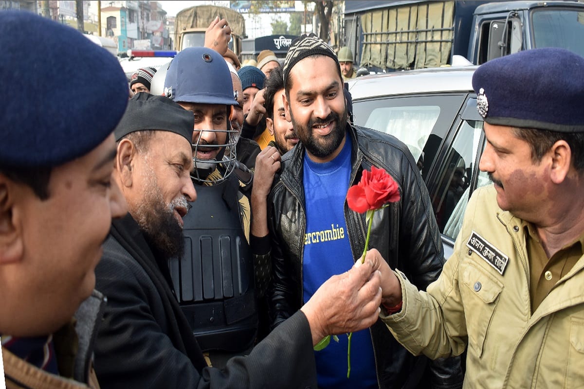 Police officials have distributed flowers to Muslim people on the Namaz after the violence in Meerut