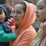 सर्दी का असर, गर्म कपड़ों में कैद लोग