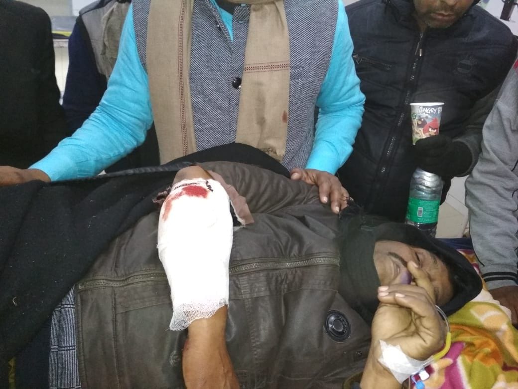 Businessman being robbed and injured