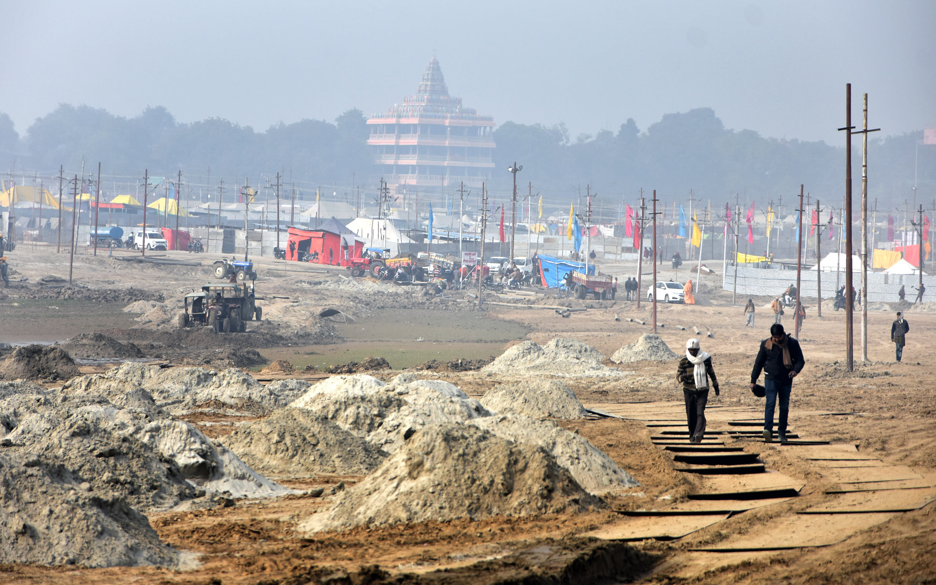 Bathing Ghat, three km away from the camps of Kalpavis, 40% work of Magh fair is still incomplete
