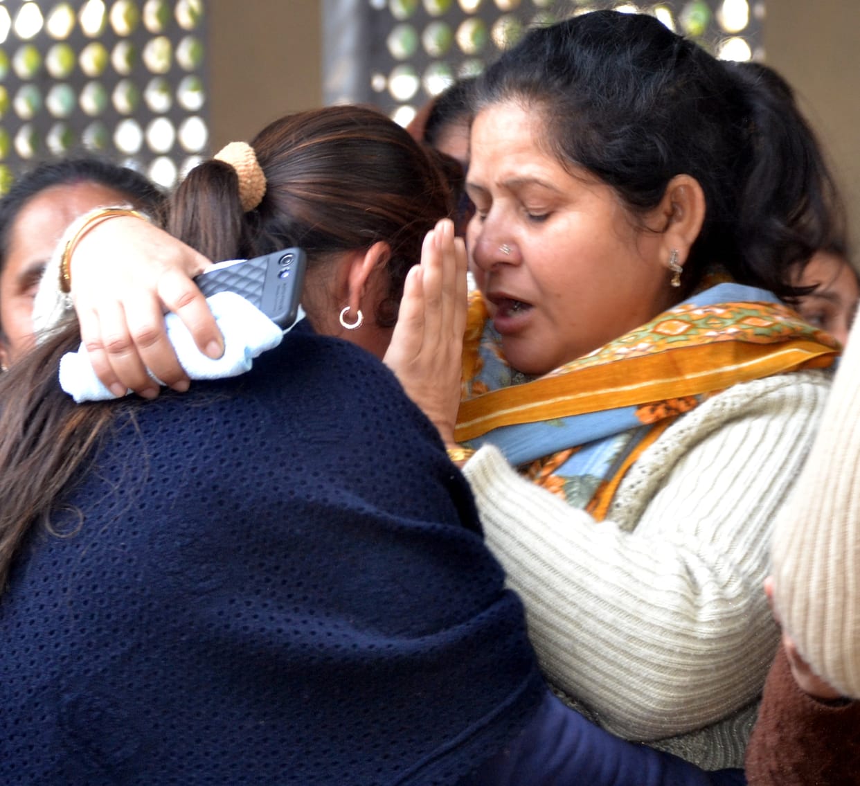 Accused's mother said, kill us too