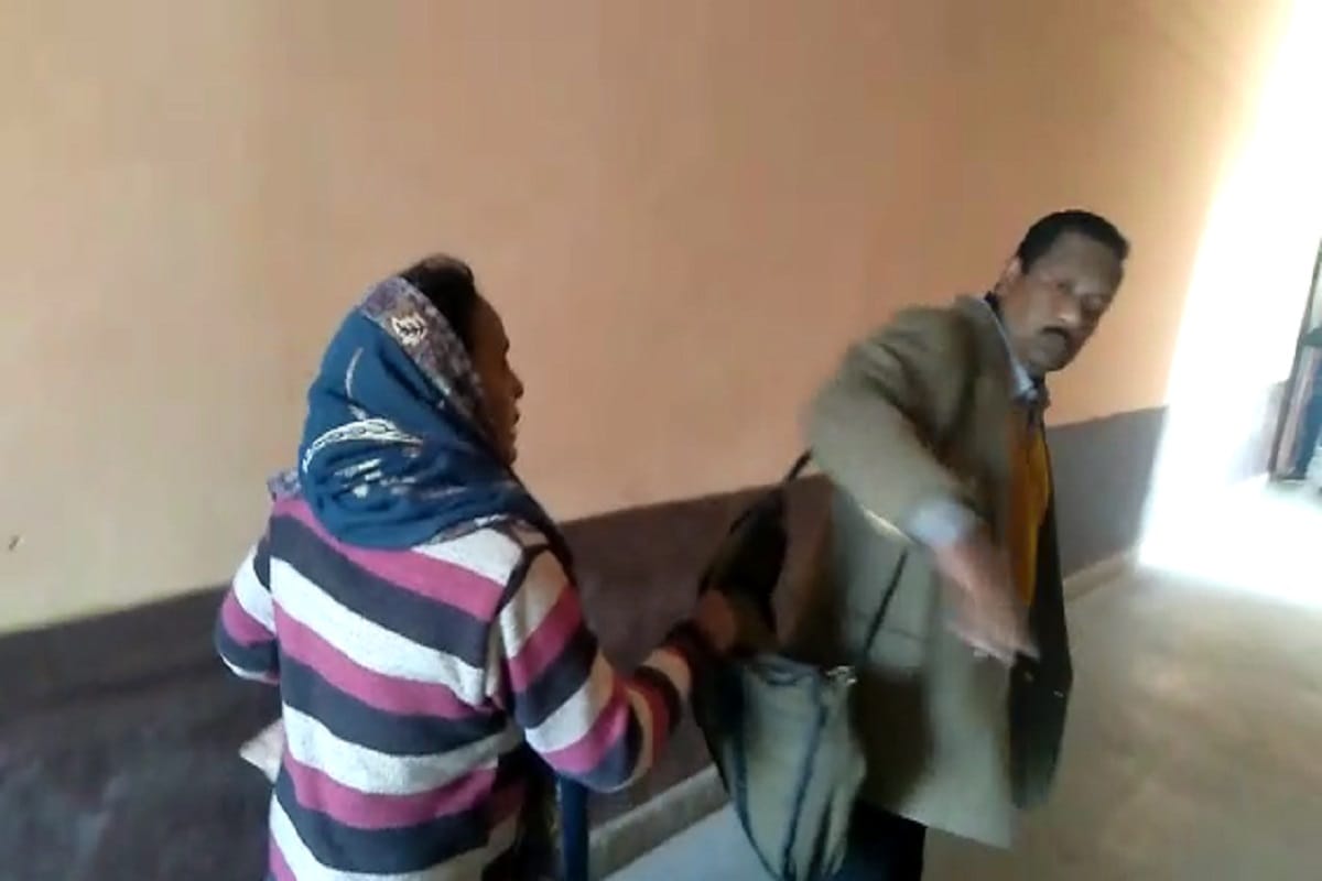 Lekhpal beaten up a woman in Tehsil Office at Bijnor city and video viral