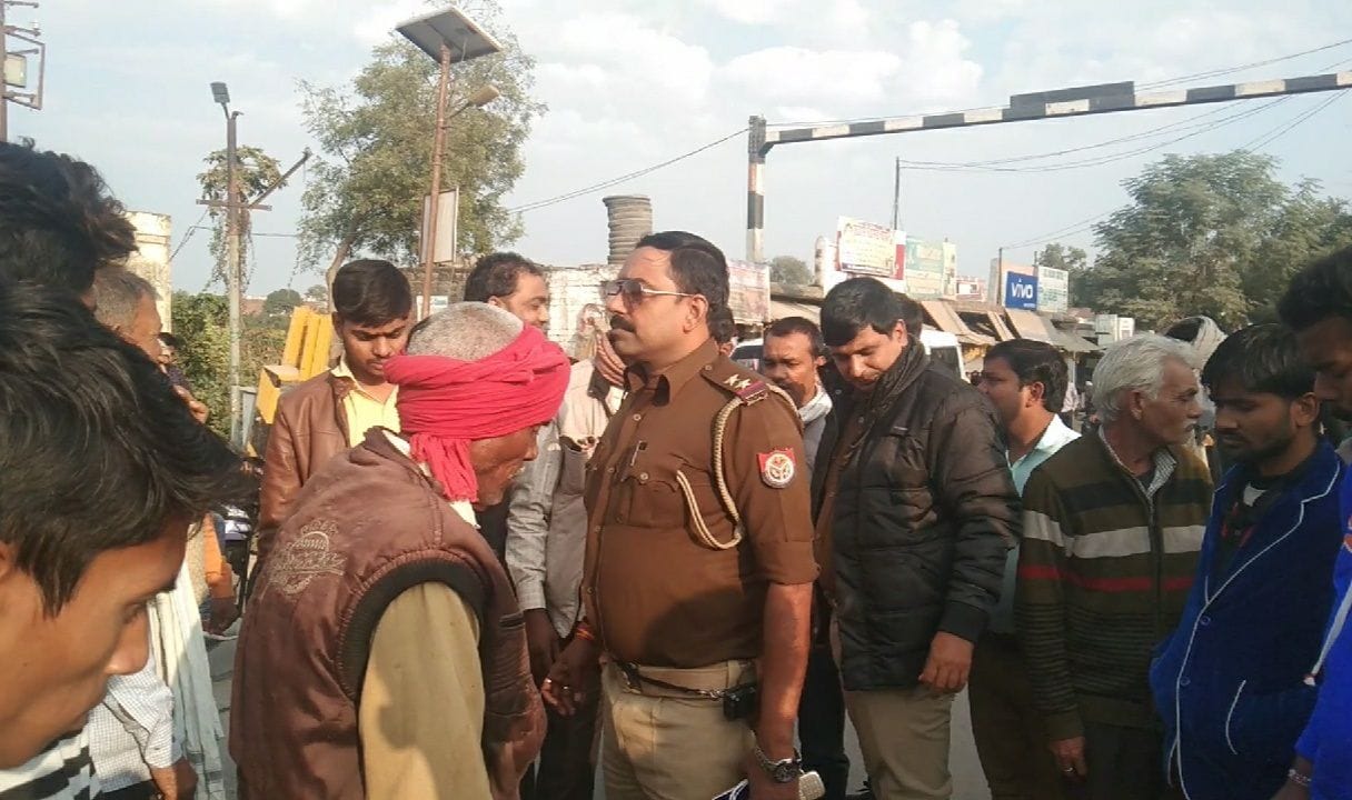 The train passed over the farmer at the railway crossing, narrowly escaped