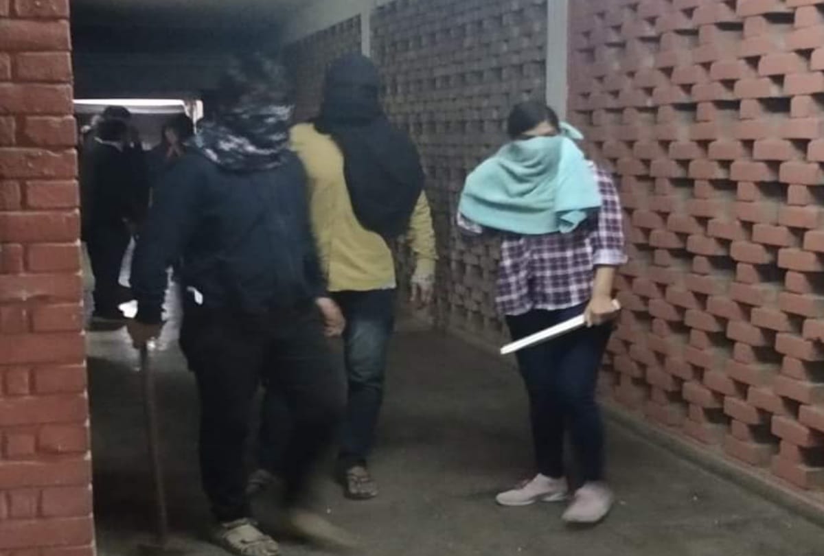 Question raising against JNU professor over violence