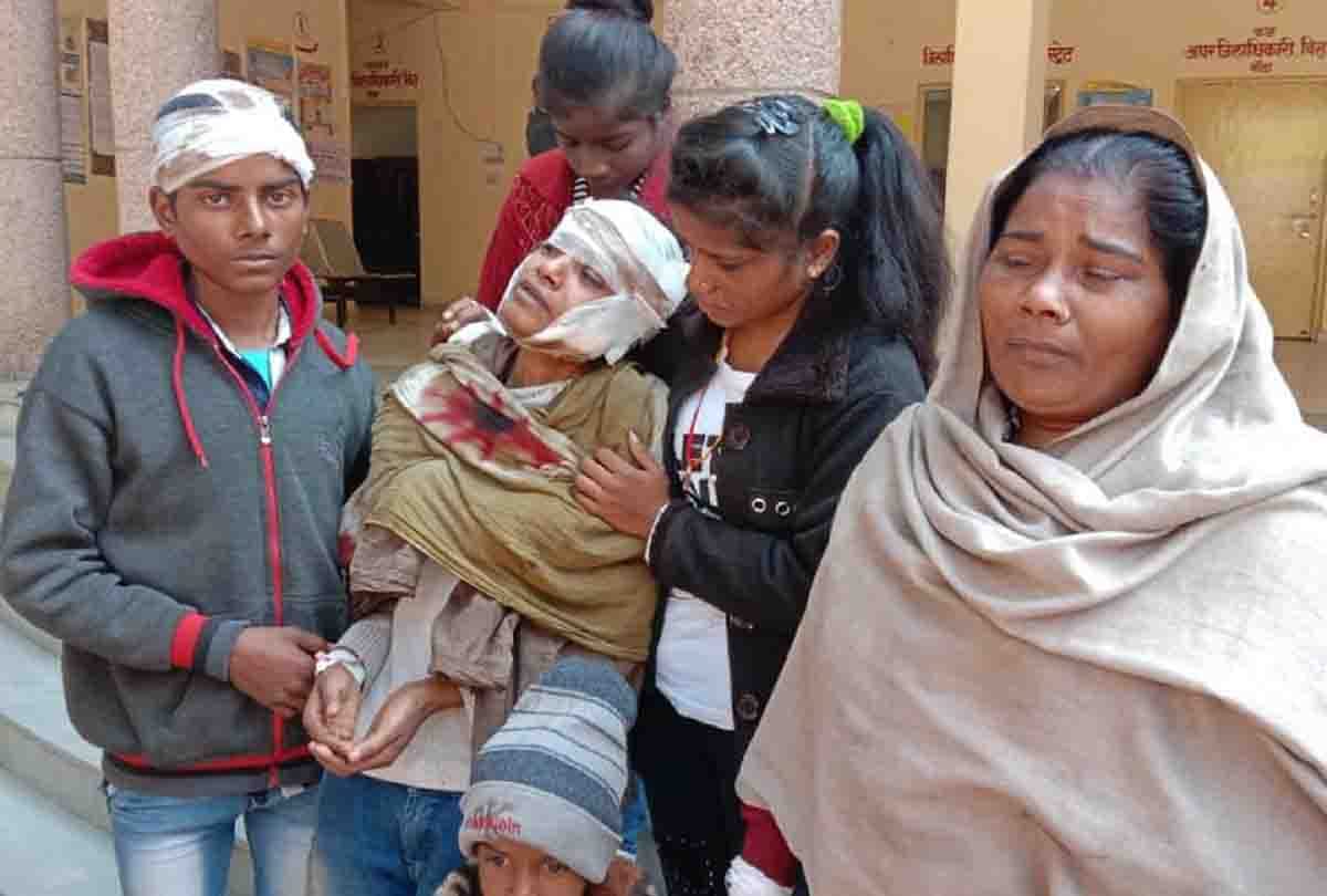 Woman and four children beaten by people