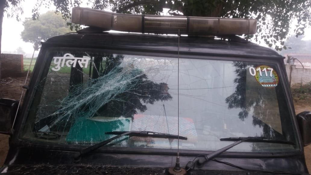 The mob pelted stones at the police to stop the construction