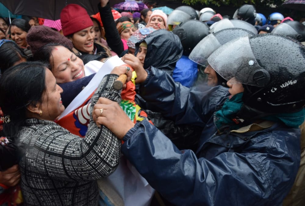 Anganwadi Workers Protest and Argument with police during rainfall in dehradun
