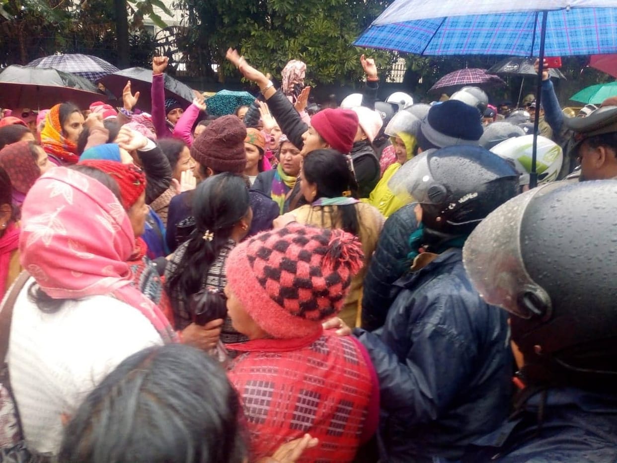 dehradun : Anganwadi Workers sitting on dharna in rain and cold