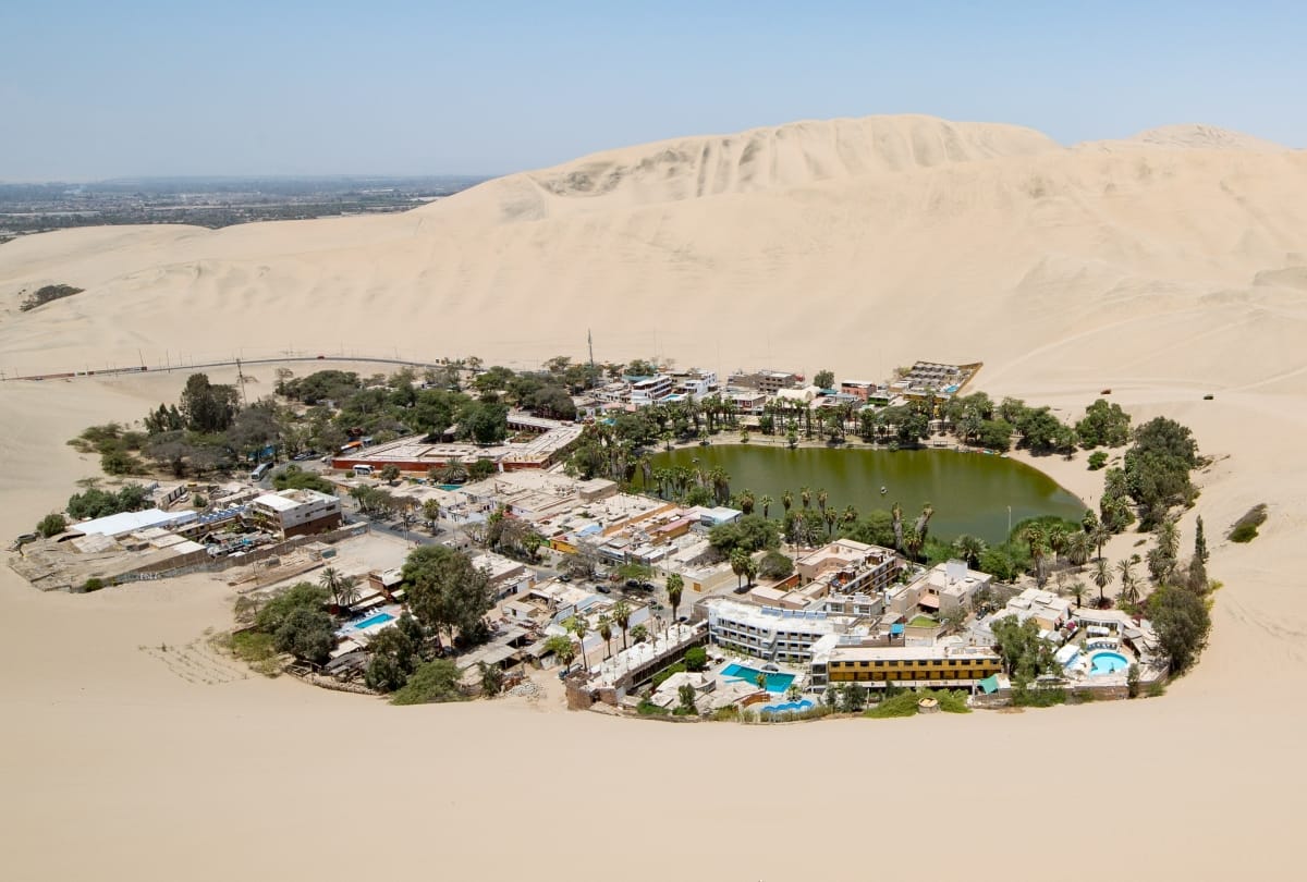 Popular lake among tourists where soil water removes disease OMG the oasis of america in huacachina