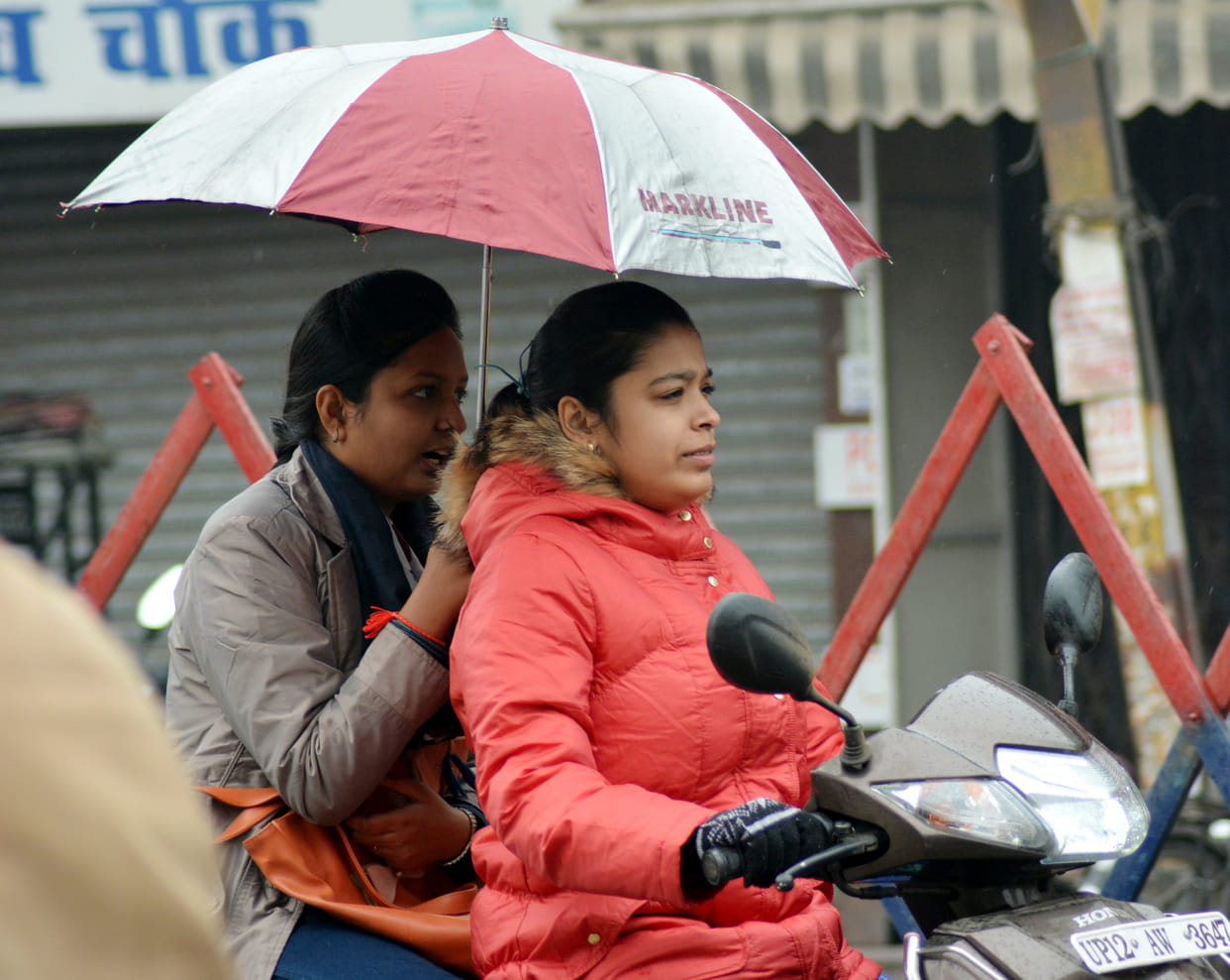People suffering from cold due to rain