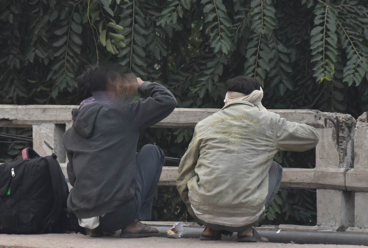 alcoholics are openly drinking liquor on the road