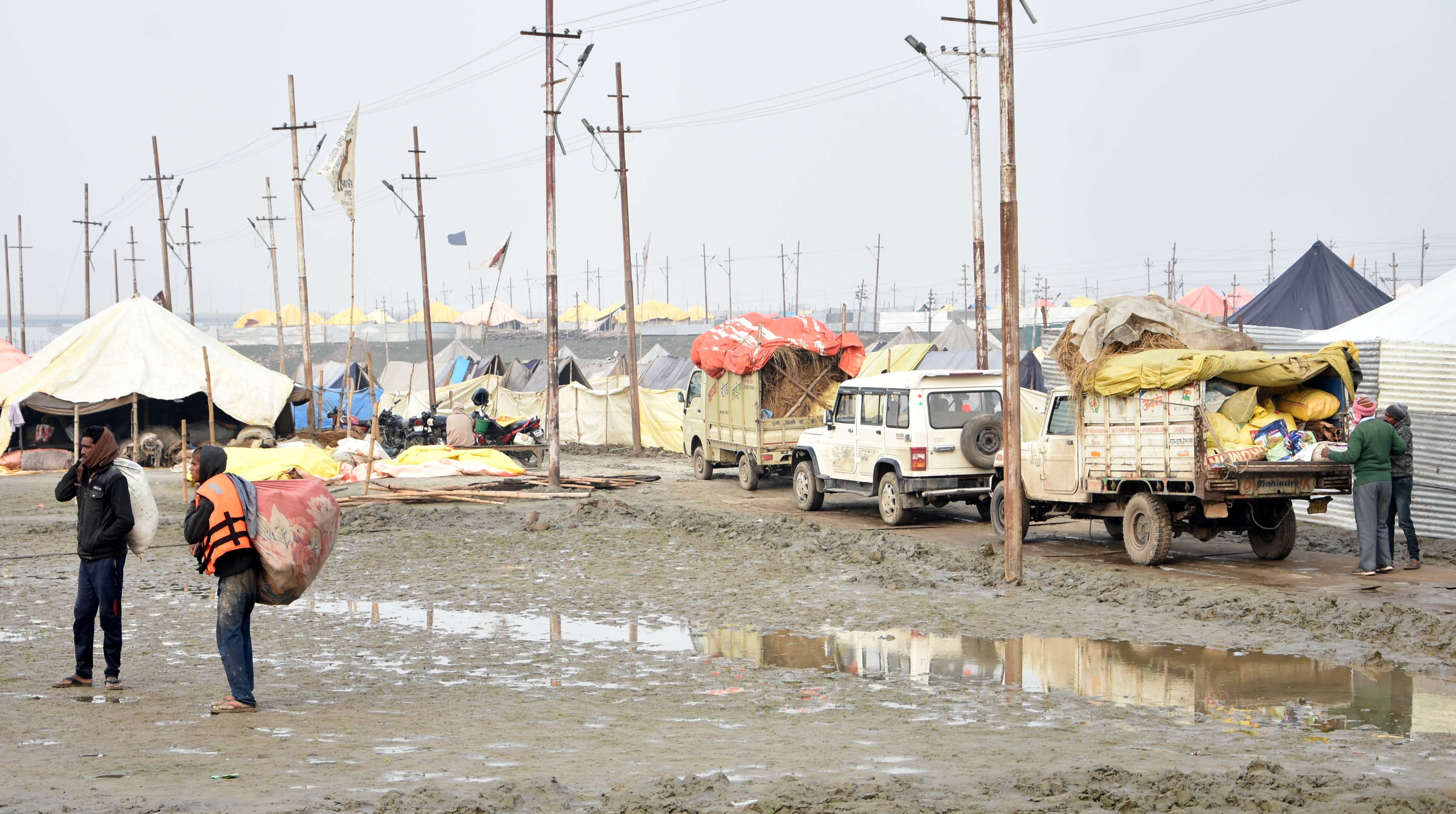 Troubles in Magh Mela, rain, water logging, slippery mud