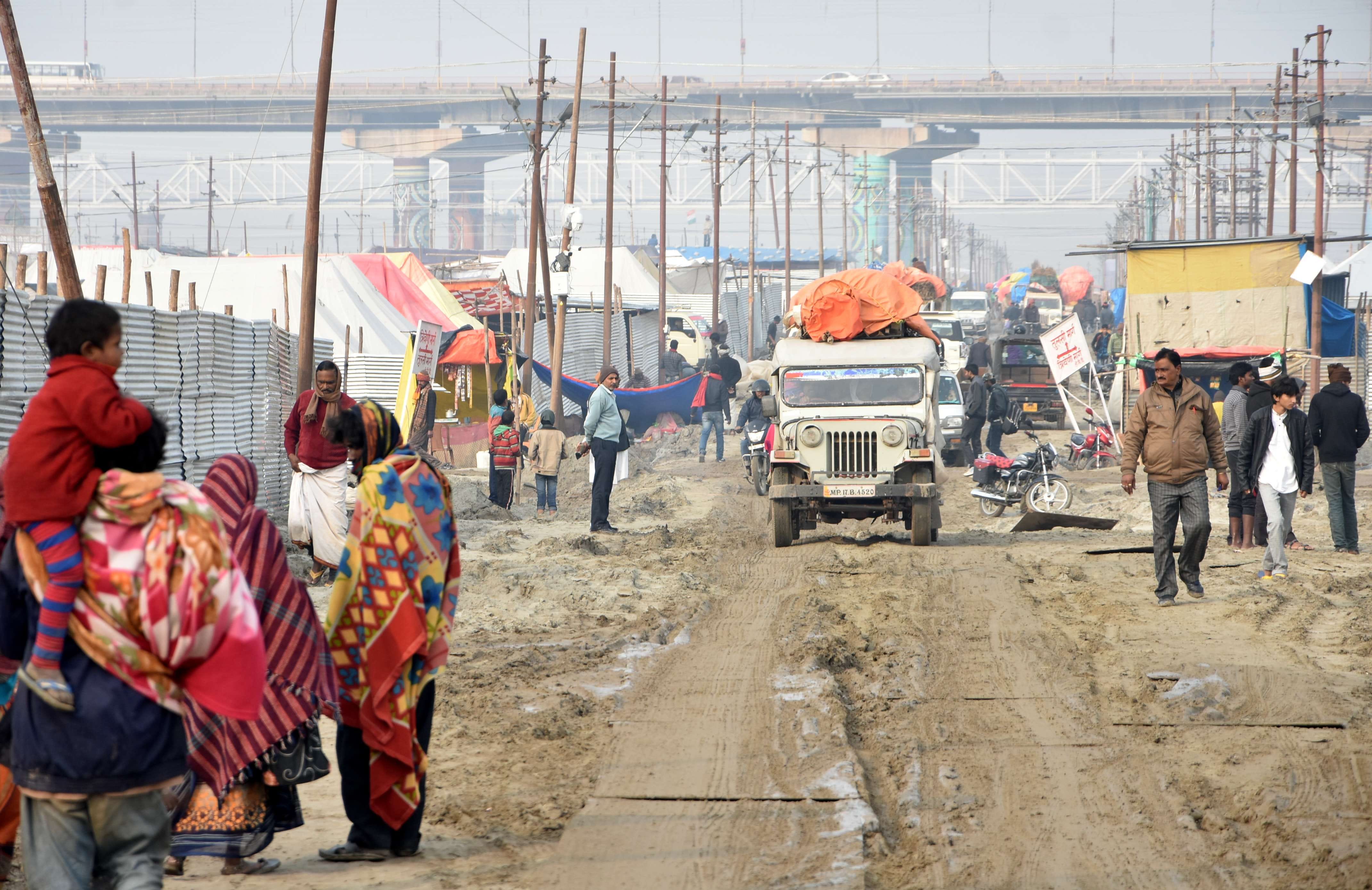 Troubles in Magh Mela, rain, water logging, slippery mud
