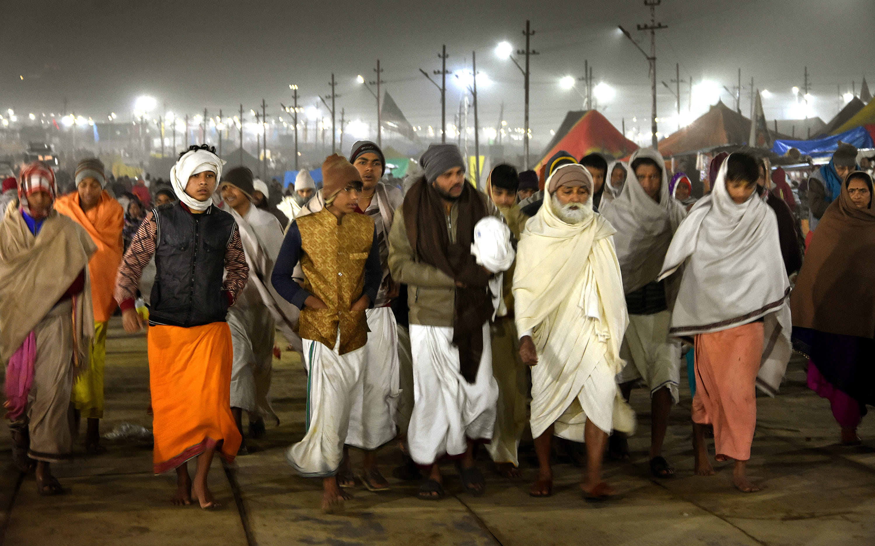 A holy dip in the Sangam on Paush Purnima, opening of the Magh Mela